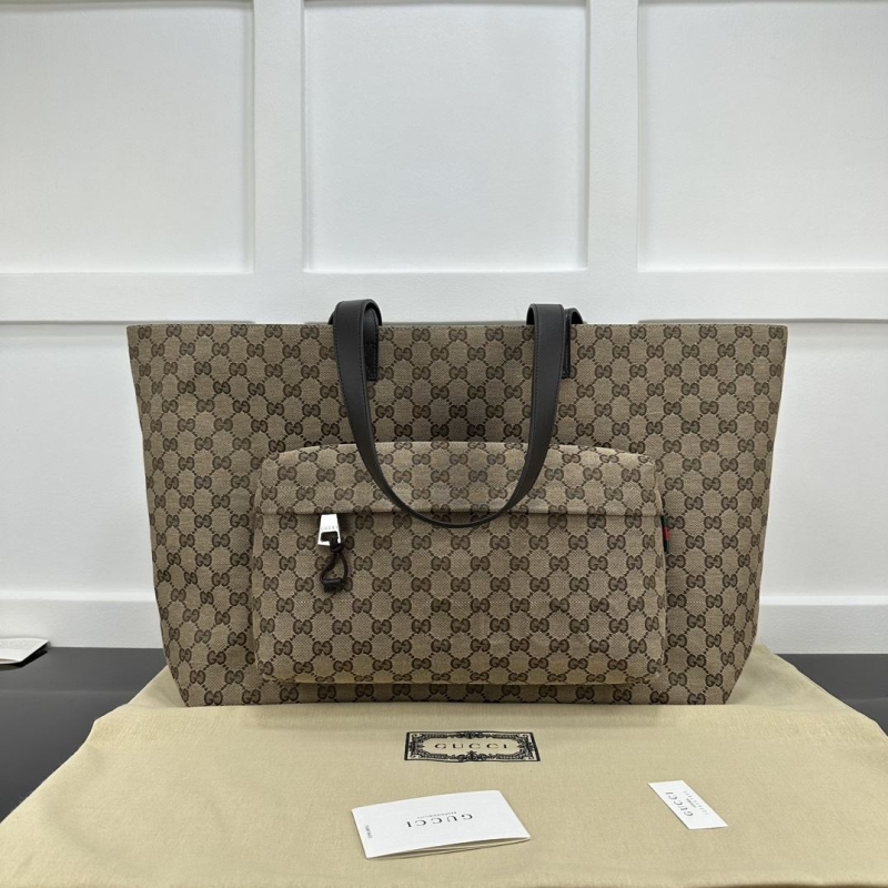 G*u*i shopping bags